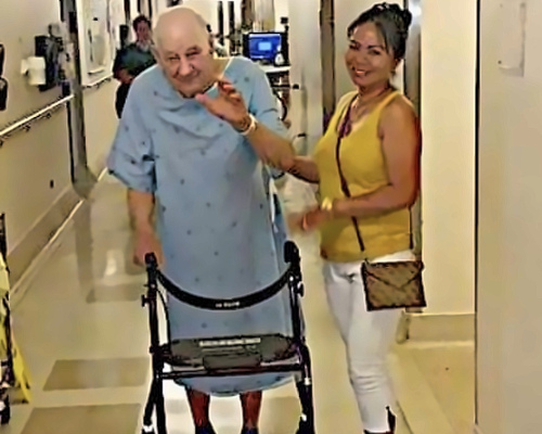Filipino Homecare caregiver with client